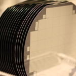 Cathode side of planar silicon sensors on 6" wafers of various thicknesses.